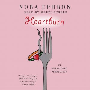 Audiobook cover for "heartburn" by nora ephron, read by meryl streep, featuring a fork with a heart-shaped adornment at the intersection of its tines, set against a pink background, with praise for ephron's writing from the chicago tribune.