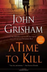 A captivating book cover displaying the title "a time to kill" by john grisham, with a silhouette of a person ascending a staircase bathed in dramatic golden light.