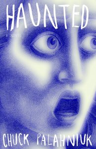 Book cover for 'haunted', a novel by chuck palahniuk, featuring an intense and ghostly face expressing shock or horror, setting a chilling mood for the story within.