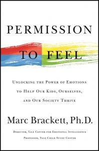 A book cover for "permission to feel" by marc brackett, ph.d., featuring bold typography with a brush-stroke design in the background representing a spectrum of emotions.