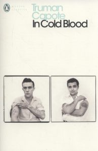 Cover of the book "in cold blood" by truman capote, featuring two black and white mugshot images of men with tattoos on their arms, one looking directly at the camera and the other slightly away.