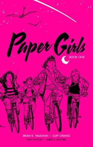 Four animated girls riding bicycles on an adventure against a vibrant pink background, with a title "paper girls book one" indicating a graphic novel cover.