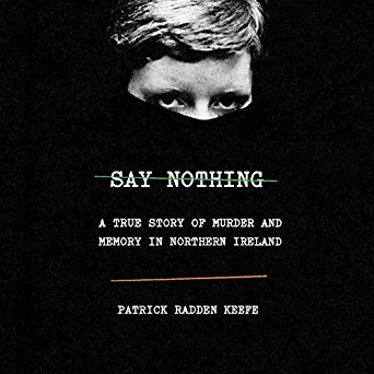 Intense and haunting: a woman's eyes emerge from the shadows on the cover of 'say nothing: a true story of murder and memory in northern ireland' by patrick radden keefe.