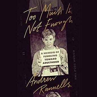 The image shows a book cover with the title "too much is not enough: a memoir of fumbling toward adulthood" by andrew rannells. the cover features a photo of a person holding a framed photograph of themselves as a child, conveying a sense of looking back on one's journey from youth to adulthood. the design uses dark tones with yellow and white text, creating a vintage aesthetic.