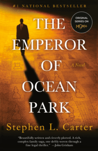 Book cover of “The Emperor of Ocean Park” by Stephen L. Carter. Shows a silhouette of a man on a golden chessboard.