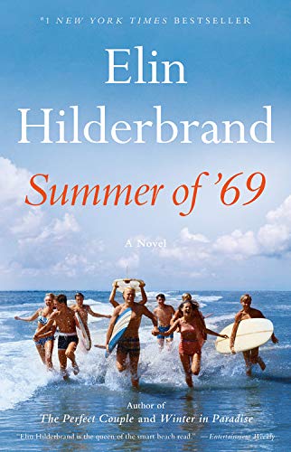 A group of carefree young adults run into the sea with surfboards, basking in the joy of summer on a sunny day, symbolizing the essence of a nostalgic and adventurous season captured in elin hilderbrand's novel "summer of '69.