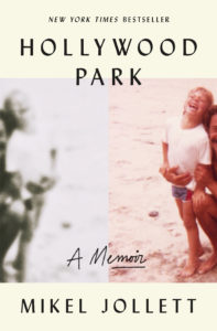 The image appears to be a cover of a book titled "hollywood park" by mikel jollett. the design is split into two vertical halves: the left side features a blurry, faded image, while the right side shows a nostalgic photograph of two smiling children enjoying a bright, sunlit day. it is labeled as a "new york times bestseller" and is characterized as "a memoir.