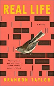A sparrow perches against a vibrant orange backdrop with a geometric pattern, gracing the cover of 'real life,' a novel by brandon taylor.
