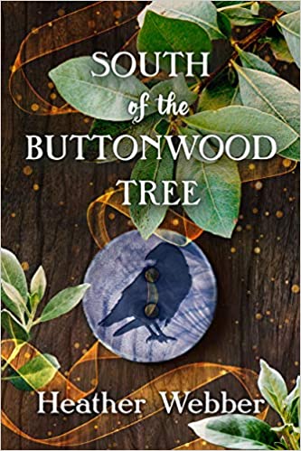 Book cover of 'south of the buttonwood tree' by heather webber, featuring artistic representation with a mystical blue button and silhouette of a girl amidst green leaves on a wooden background.