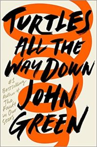 The image shows a book cover with a title that reads "turtles all the way down" by john green, featuring stylized text predominantly in orange that forms a spiral shape, possibly alluding to the metaphorical or thematic elements of the book.