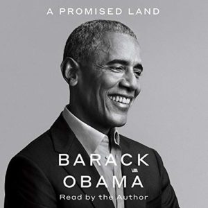 Black and white portrait of a smiling man, possibly a public figure, with the text "a promised land, barack obama, read by the author" indicating that this is an audio book cover.