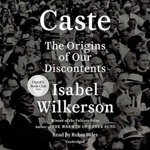 A crowd of attentive listeners from a past era, black and white photograph, featured on the cover of isabel wilkerson's book "caste: the origins of our discontents.