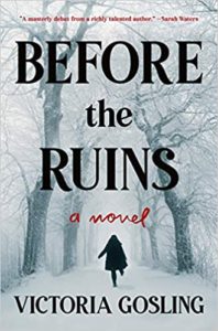 A solitary figure walks away into a snowy, winter forest on the cover of victoria gosling's novel "before the ruins.