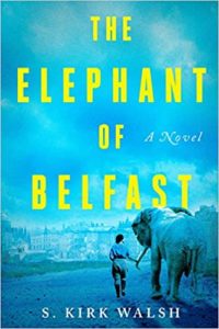 A novel cover depicting a child holding the tail of an elephant, walking side by side – 'the elephant of belfast' by s. kirk walsh.