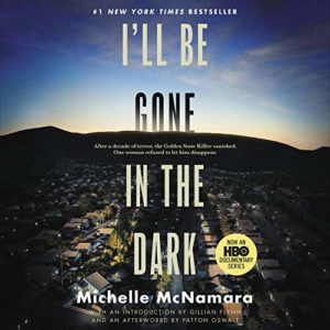 An aerial view of a peaceful suburban neighborhood at dusk with the title "i'll be gone in the dark" prominently displayed, suggesting a true crime theme.