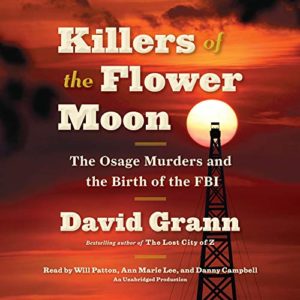A dramatic sky with fiery hues provides the backdrop for an oil derrick, which is silhouetted against the vivid colors. prominently overlaid text reads "killers of the flower moon: the osage murders and the birth of the fbi" by david grann, indicating that this is a cover for an audiobook dealing with historical events and the origins of the fbi.
