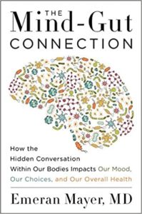 Cover of "the mind-gut connection" book featuring an illustration of a brain composed of various gut-related elements, with a subtitle explaining the book's focus on the conversation within our bodies that impacts mood, choices, and overall health.