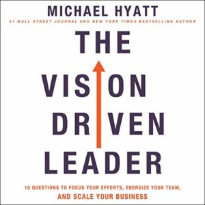 Cover of a book titled "the vision driven leader" by michael hyatt, a wall street journal and new york times bestselling author. the cover features a bold, central upward-pointing orange arrow, with the text providing a succinct summary: "10 questions to focus your efforts, energize your team, and scale your business.