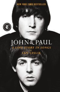 Black and white cover of "John & Paul: A Love Story in Songs" by Ian Leslie, featuring two musicians' faces.