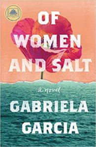 The cover of "of women and salt" by gabriela garcia, featuring a watercolor illustration of a vibrant flower over a seascape background with the title and author's name prominently displayed.