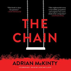 Book cover of 'the chain' by adrian mckinty, featuring a striking minimalist design with the title hanging from a chain against a stark, dark background, underscored by a brush of red at the bottom.