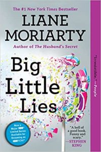 A colorful book cover of liane moriarty's "big little lies," featuring a burst of confetti, suggestive of both celebration and chaos.