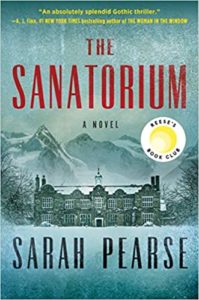 The sanatorium" - a chilling novel by sarah pearse set against a backdrop of snow-covered mountains with an imposing building at its heart, hinting at the dark mystery within.