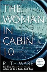 The woman in cabin 10" book cover by ruth ware, depicting a suspenseful and moody scene with water droplets on a glass surface, suggesting a mystery or thriller theme within its pages.