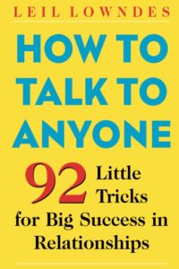 A striking book cover for "how to talk to anyone" by leil lowndes, featuring 92 little tricks for cultivating big success in relationships through effective communication. the cover utilizes a bold yellow background with red and blue text for a vibrant, attention-grabbing look.
