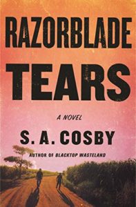 Two figures walking down a rural road at sunset with the title "razorblade tears" and the author's name "s. a. cosby" displayed prominently above.