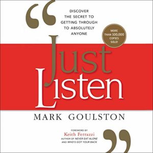 The image is the cover of the book "just listen" by mark goulston, which offers insights on discovering the secret to getting through to absolutely anyone. the cover has a white and red color scheme with bold typography, and it includes endorsement notes highlighting that the book is a bestseller with more than 100,000 copies sold.