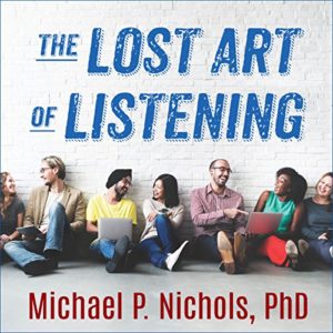 A diverse group of people casually sitting together along a wall, possibly discussing or having a shared experience, with the title 'the lost art of listening' by michael p. nichols, phd, overlaid at the top suggesting a thematic connection to communication and understanding.