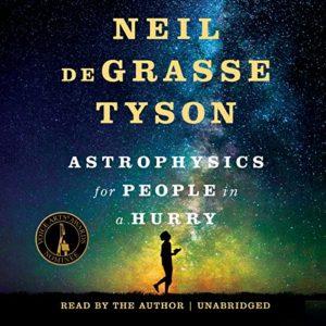 An illustration of a book cover titled "astrophysics for people in a hurry" written by neil degrasse tyson, featuring a silhouette of a person holding a briefcase against a backdrop of a starry night sky, with an emblem indicating the audio version is read by the author.