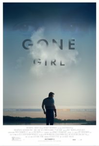 A man standing alone, looking across a vast expanse of water under a moody sky, with the title "gone girl" prominently displayed above.