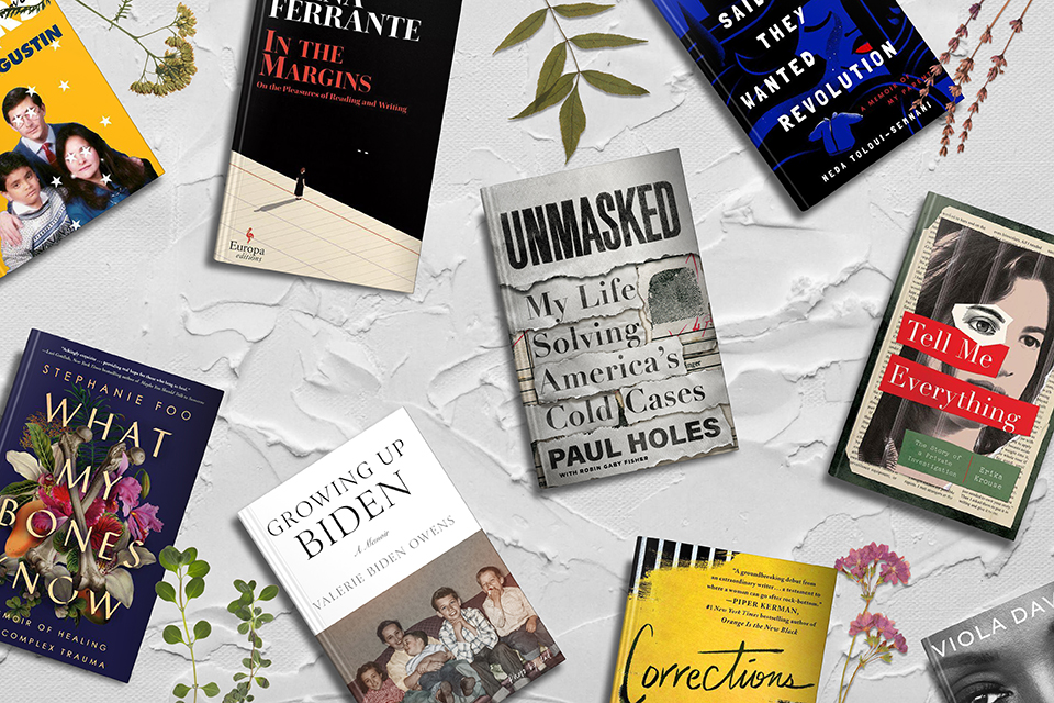 A diverse collection of books scattered on a surface, suggesting a range of genres from memoirs to novels, reflecting varied literary tastes and interests.