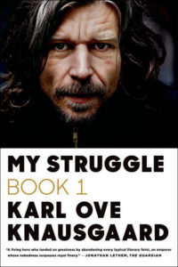 A portrait of a man with long hair and a serious expression featured on the cover of "my struggle book 1" by karl ove knausgaard, accompanied by a quote praising the author's work.