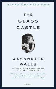 A book cover of the memoir "the glass castle" by jeannette walls, acclaimed as a new york times bestseller and featuring praises from other authors.