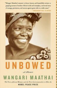 A portrait of wangari maathai with a beaming smile, featured on the cover of her memoir "unbowed".