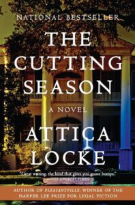 A book cover for "the cutting season" by attica locke, touted as a national bestseller and recipient of the harper lee prize for legal fiction, lauded by the los angeles times for great writing, with an image of a stately house at night, forebodingly lit from below, setting the stage for a compelling mystery.