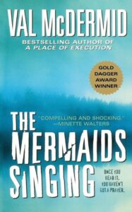 The mermaids singing" - a captivating thriller by bestselling author val mcdermid, with acclaim highlighted by a quote from minette walters: "compelling and shocking.
