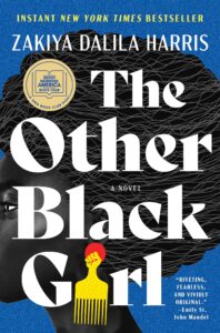 A book cover for the novel "the other black girl" by zakiya dalila harris, featuring a stylized depiction of a black woman with an afro hair comb inserted, set against a backdrop of black scribbles. the book is noted as an instant new york times bestseller and includes praise from emily st. john mandel. it also bears the badge of being selected for the "good morning america" book club.