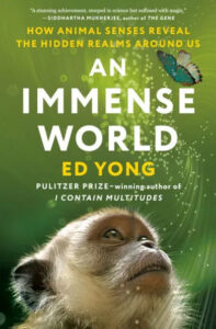 Curious primate portraits: a journey through the eyes of nature's creatures in 'an immense world' by ed yong, exploring the wonders of animal senses.