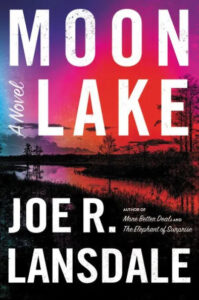 A vibrant book cover for the novel "moon lake" by joe r. lansdale, featuring layered hues of pink, purple, and blue above a tranquil lakeside scene at dusk.