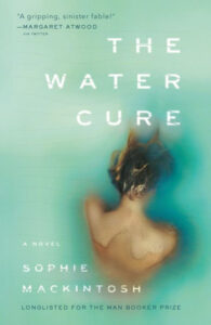 A blurred figure seems to be submerged in water, with the title "the water cure" above and the author's name, sophie mackintosh, below, hinting at a mysterious and possibly unsettling narrative.