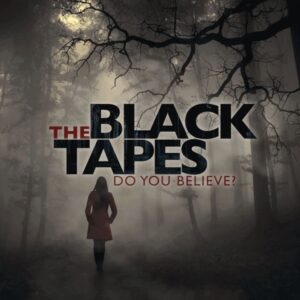 A mysterious figure in a red coat wanders into a foggy, wooded landscape under the ominous text "the black tapes - do you believe?.