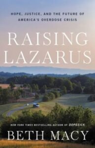 A scenic landscape at twilight with a winding road amidst green fields, under the title "raising lazarus" written by beth macy, with the tagline "hope, justice, and the future of america's overdose crisis.