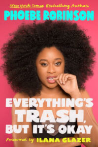 A woman with voluminous curly hair and a thoughtful expression, holding her chin, featured on a vibrant book cover titled "everything's trash, but it's okay" by phoebe robinson.