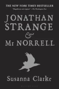 A book cover for "jonathan strange & mr norrell" by susanna clarke, featuring the silhouette of a bird in flight against a gradient gray background with the title and author's name prominently displayed.