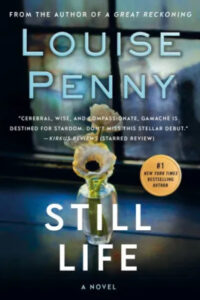 A book cover for "still life: a novel" by louise penny, featuring a delicate vase with a single flower, against a darkly shaded background. a new york times bestselling author's promise of a cerebral, wise, and compassionate story is highlighted.