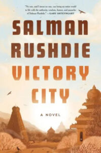 Cover of salman rushdie's novel 'victory city': a beautiful blend of warm tones illustrating a historical landscape with a statue and ancient structures, drawing readers into a tale of myth and wonder.